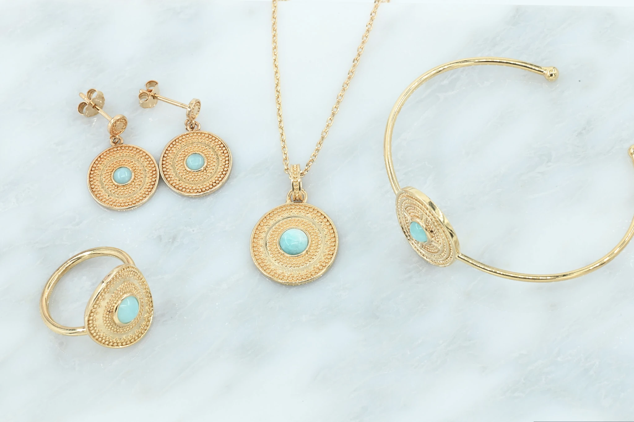 Gold-plated bohemian set met turquoise steentje