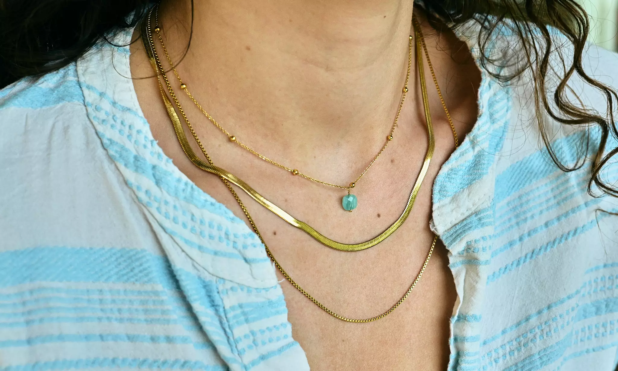 Ketting met turquoise steentje