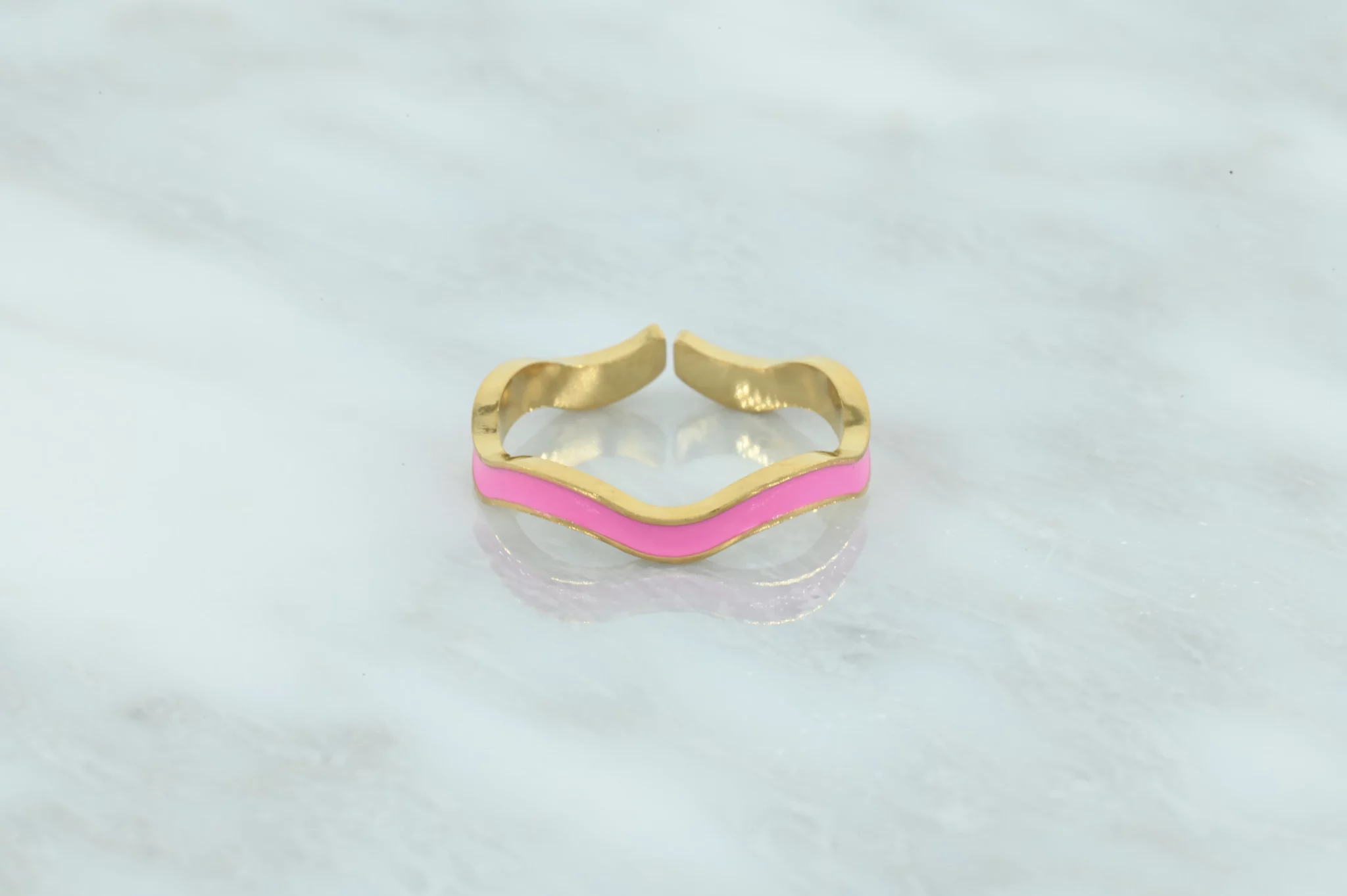 RVS fel roze fluoriserende golvende ring