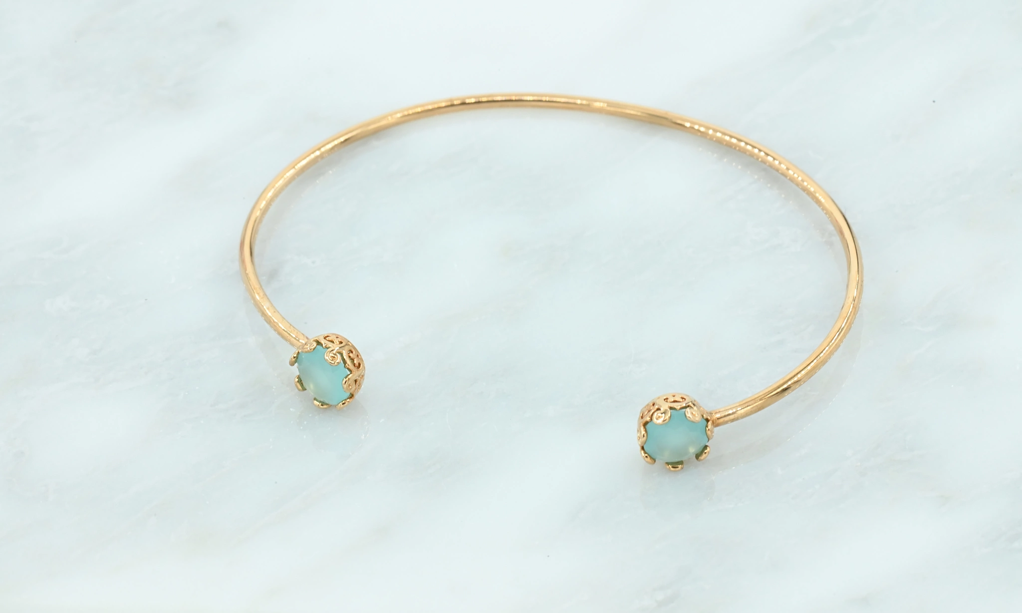 Bangle met turquoise steentjes