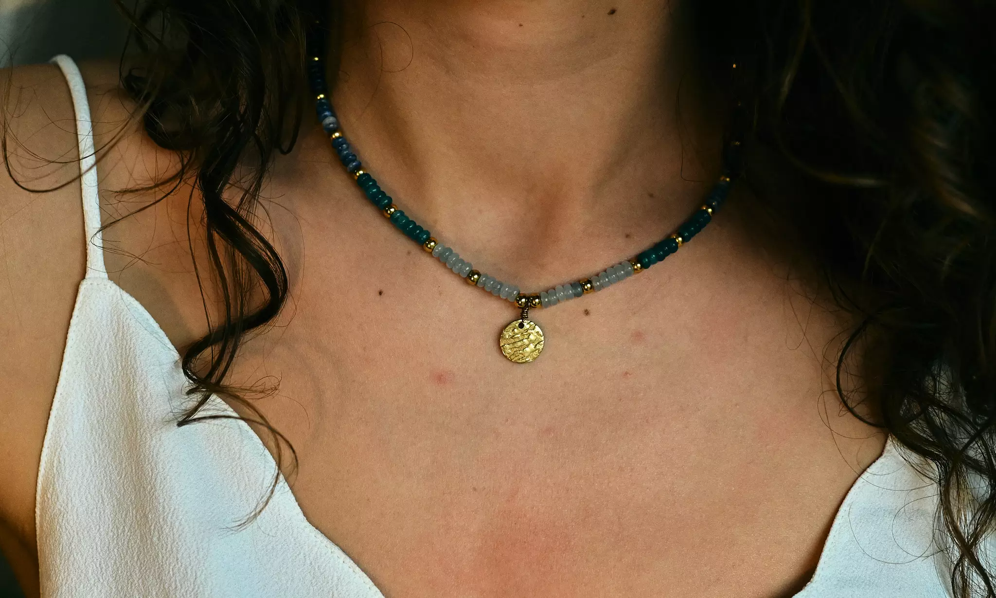 Blauw/goud kralenketting