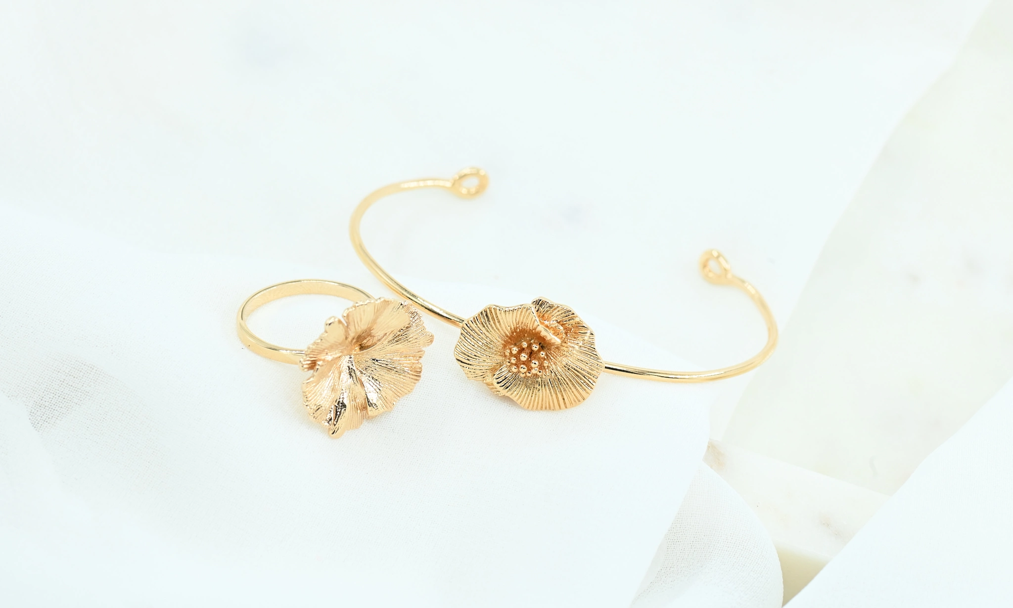 Gold plated set armband en ring met bloem